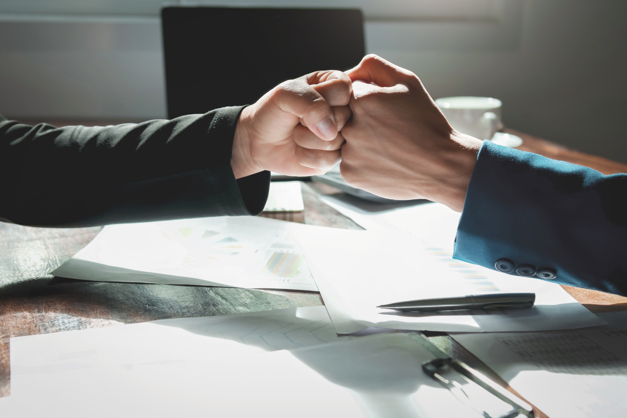 fist-bump-businessman-teamwork-concept-office fist-bump-businessman-teamwork-concept-office